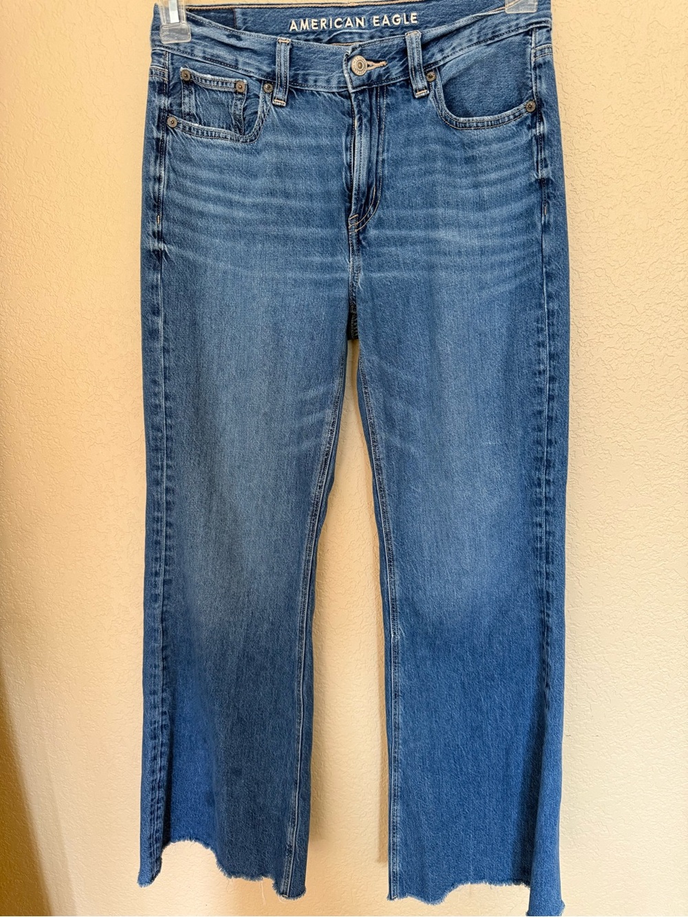 American Eagle Outfitters Medium Blue Cropped Ankle Jeans with Raw Hem